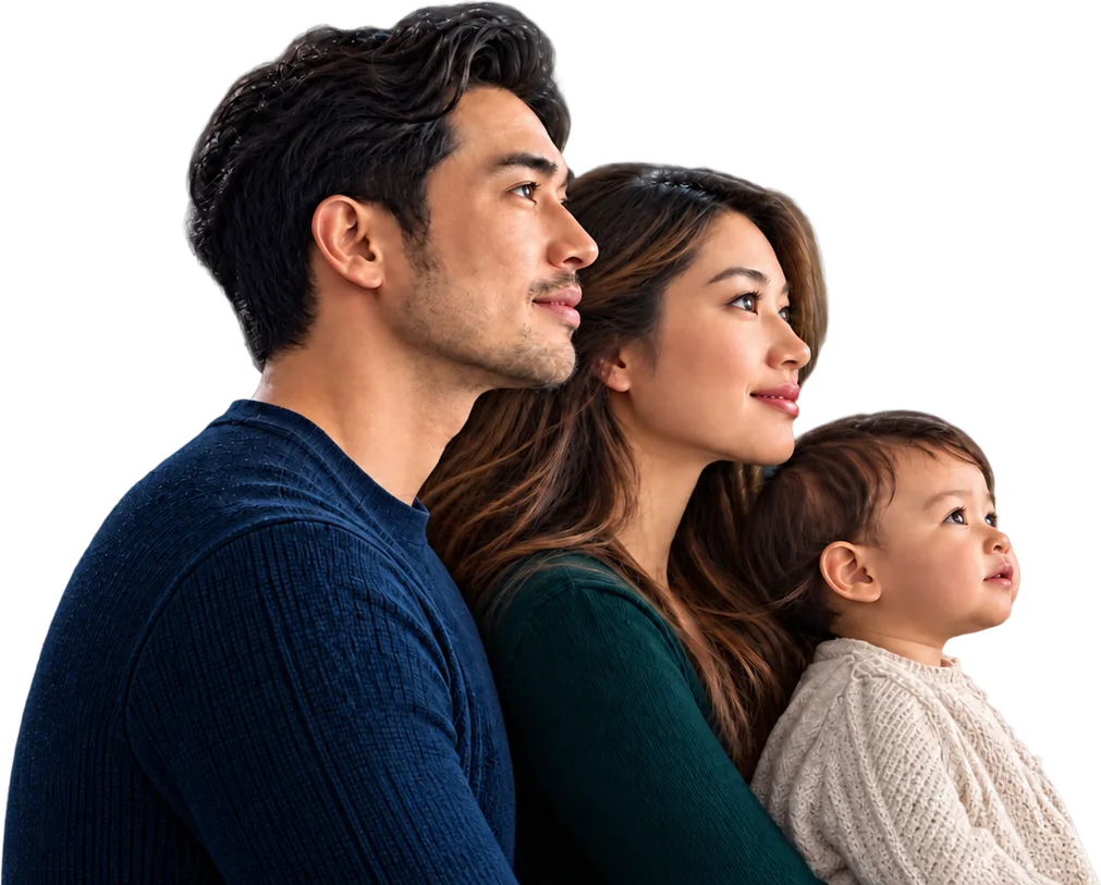 A family of three, in profile, looking up