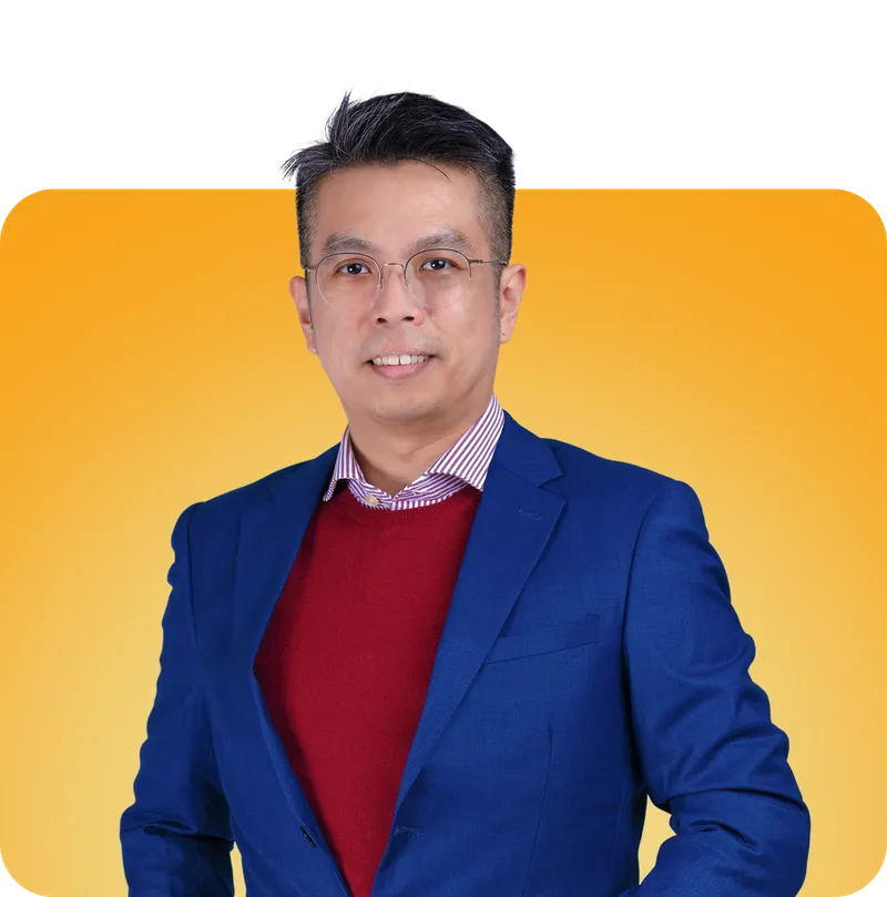 The Fonctio Healing practitioner in a blue suit on an orange ground